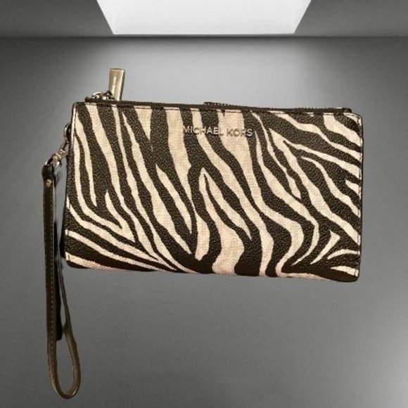 Michael Kors Handbags - Michael Kors Jet Set Zebra Pattern Wristlet Wallet (NWOT)